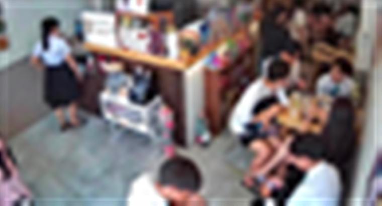 Customers at lunchtime (faces blurred)